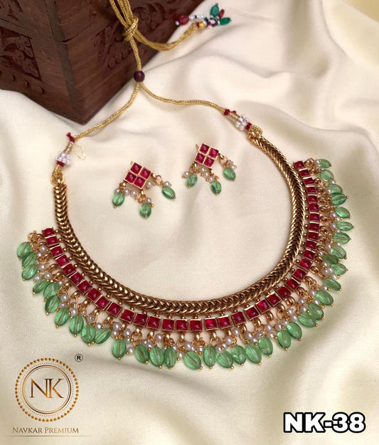 Pink kemp stone necklace with light green beads