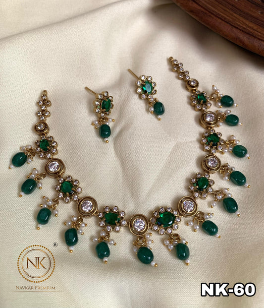 Green and white stone necklace with dark green beads