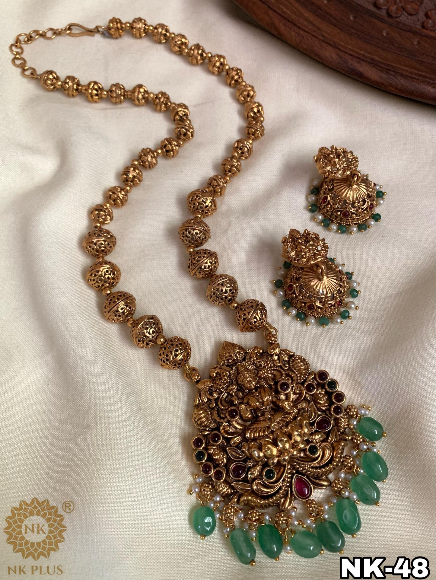 Long beads chain with laskhmi dollar and green beads